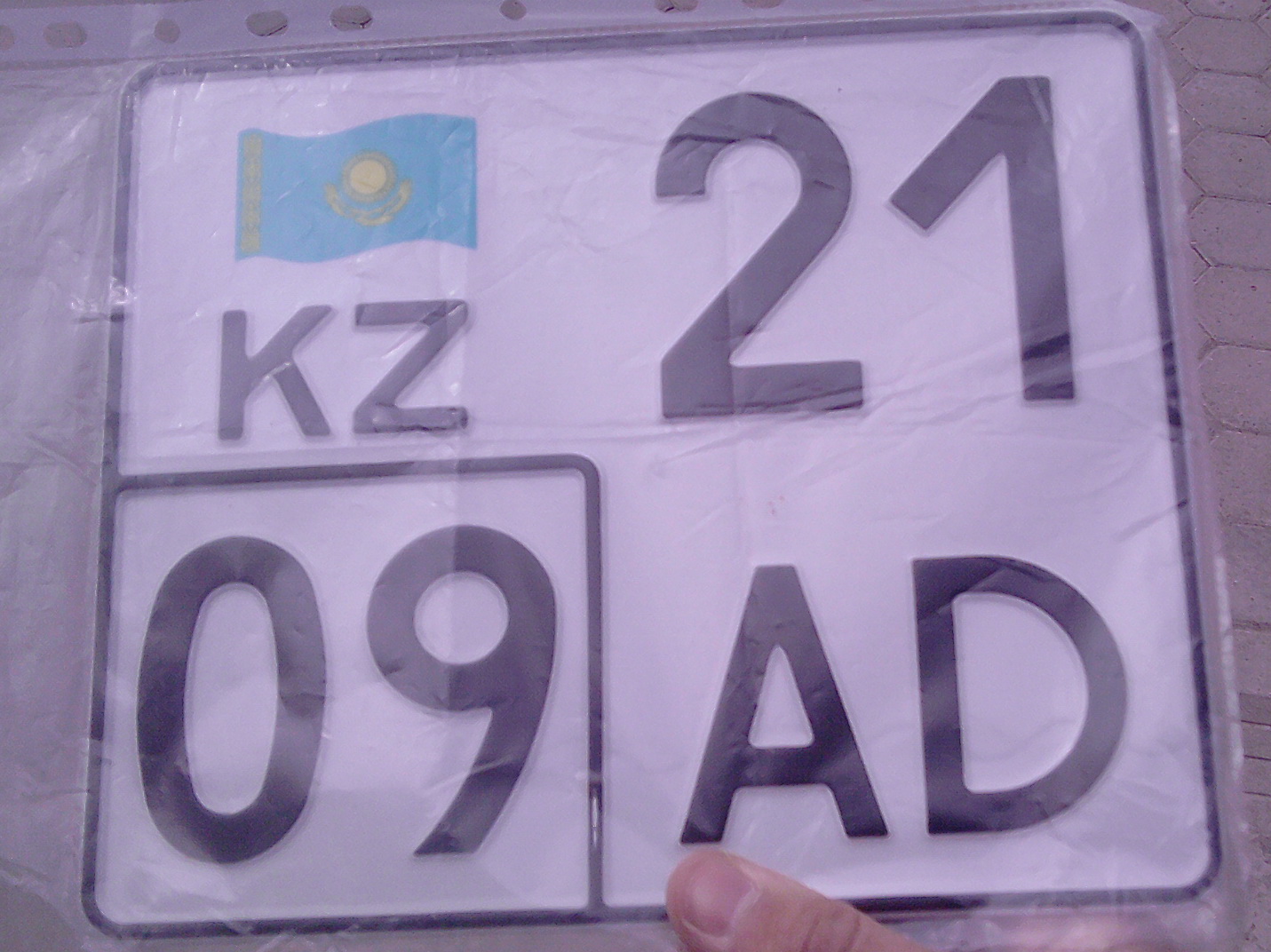 21 AD 09, License plate without vehicle 