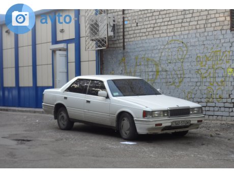 16 560-57 OK, Mazda Luce