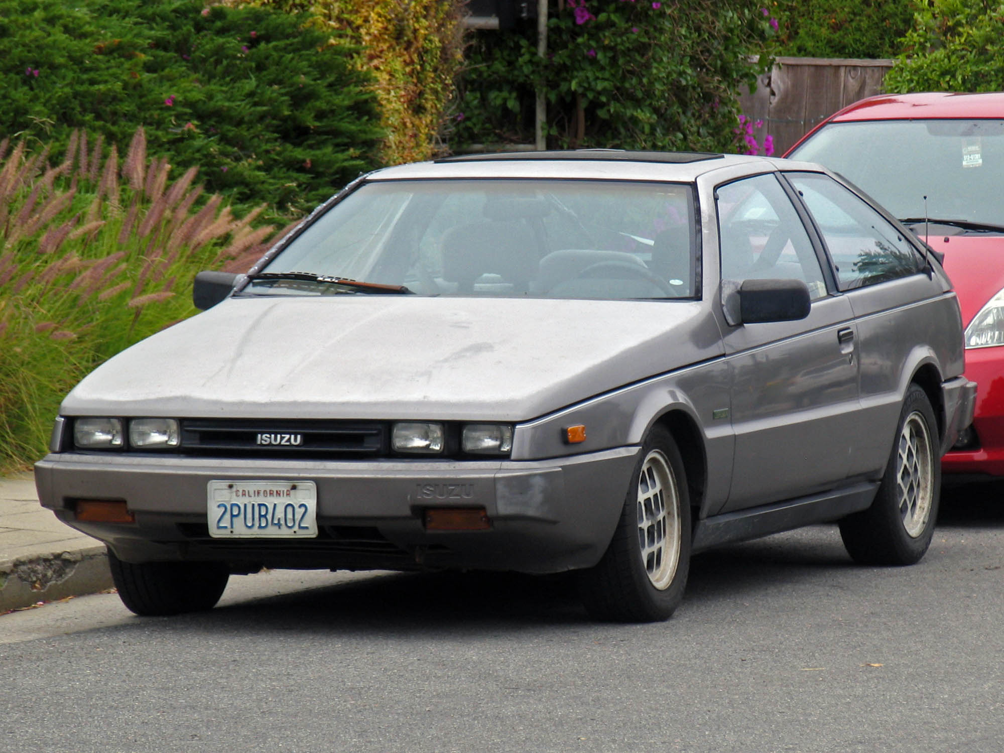 2PUB402, Isuzu Impulse 1st gen, 1983–1990