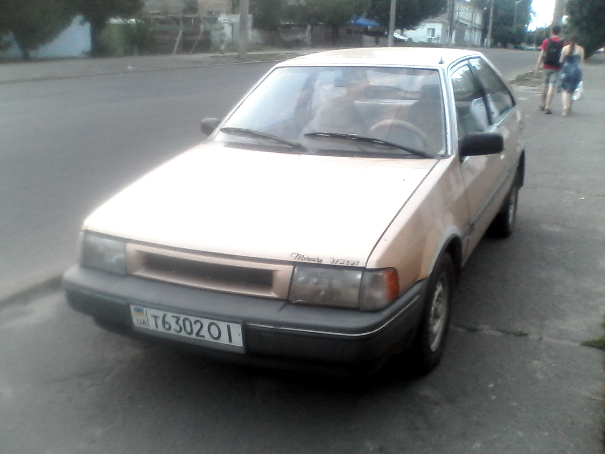 т 6302 ОІ, Mercury Tracer 1st gen 3-door Hatch (BF), 1986–1989
