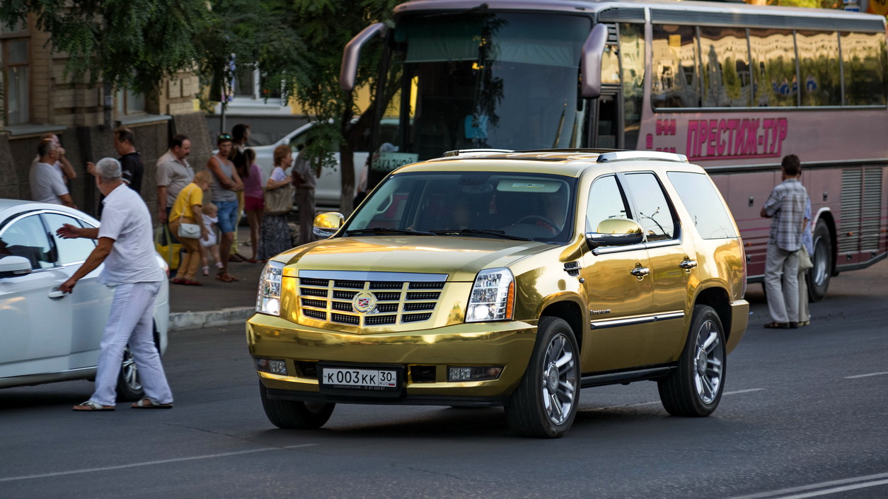 Cadillac Escalade Р·РѕР»РѕС‚РѕР№